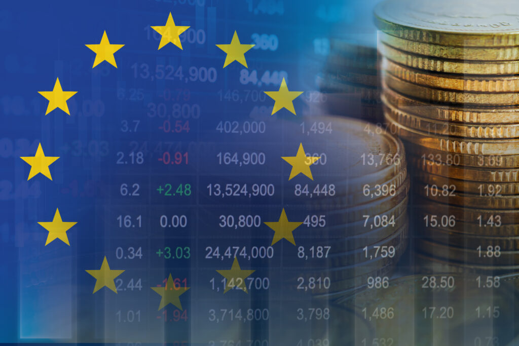 EU flag with stock market finance, economy trend graph digital technology.